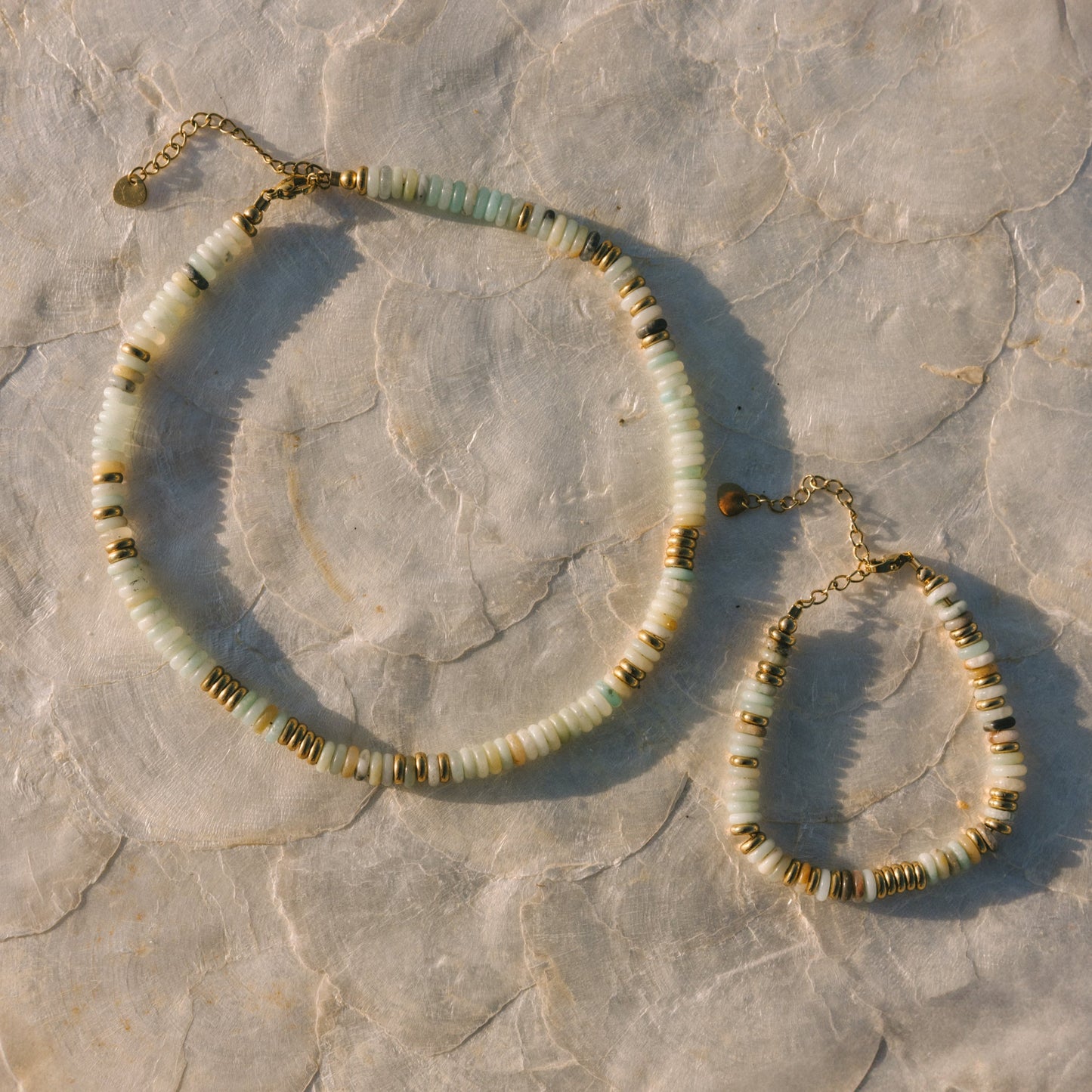 Beaded bracelet on a textured stone surface